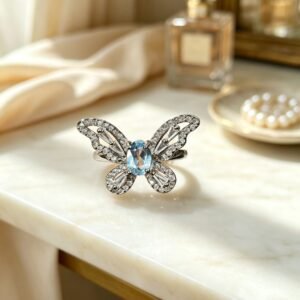 Butterfly‑Shaped Natural Blue Topaz Halo Ring, Copper Base Metal Paved Accent Stones Women Statement Gemstone Ring